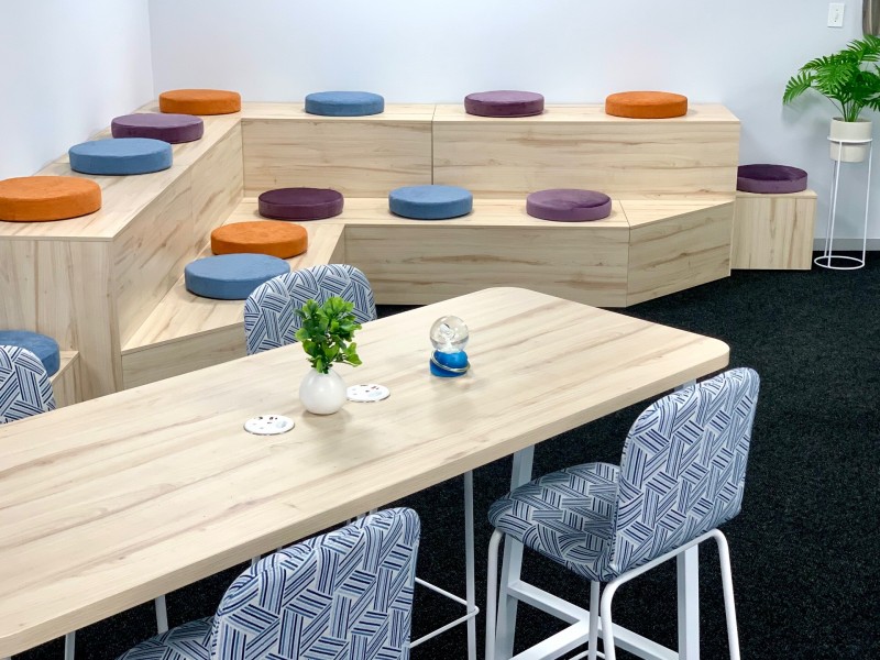 Auditorium style seating in hybrid workspace