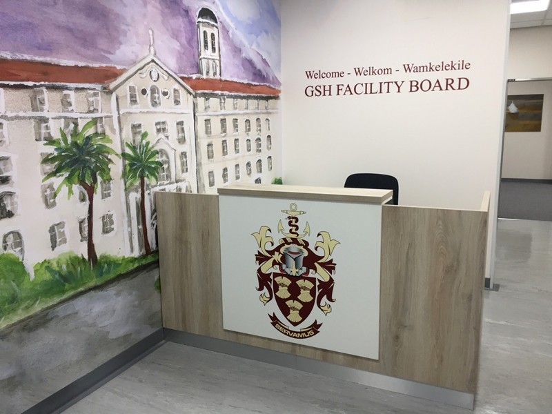 Timber and white Pioneer reception counter